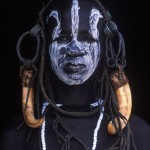 125-FACES-AFRICA-ETHIOPIA-OMO.VALLEY-Mursi.warrior